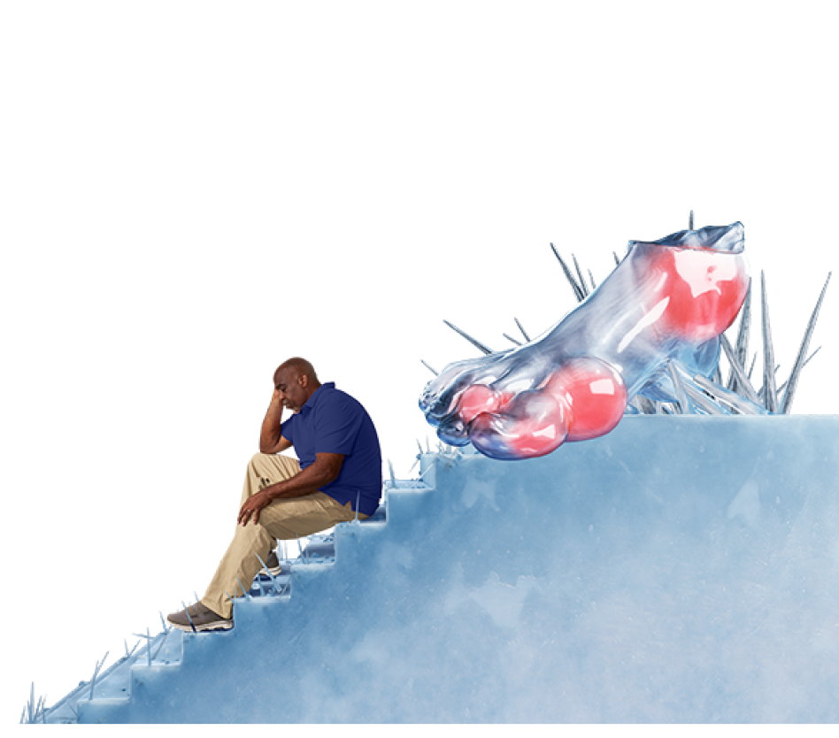 Darryl sitting with a representative gout foot behind him