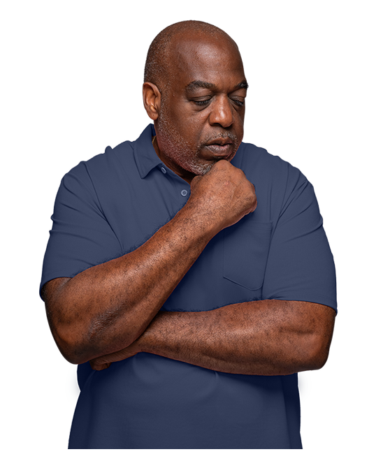 Man contemplating how quickly lowering uric acid levels may reduce the risks of long-term gout complications